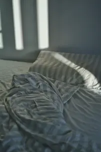 An image of an unmade bed
